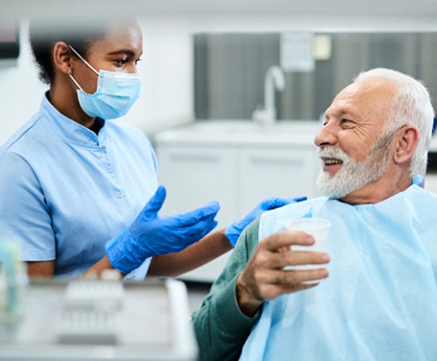 advanced dental implants procedures being explained to a patient