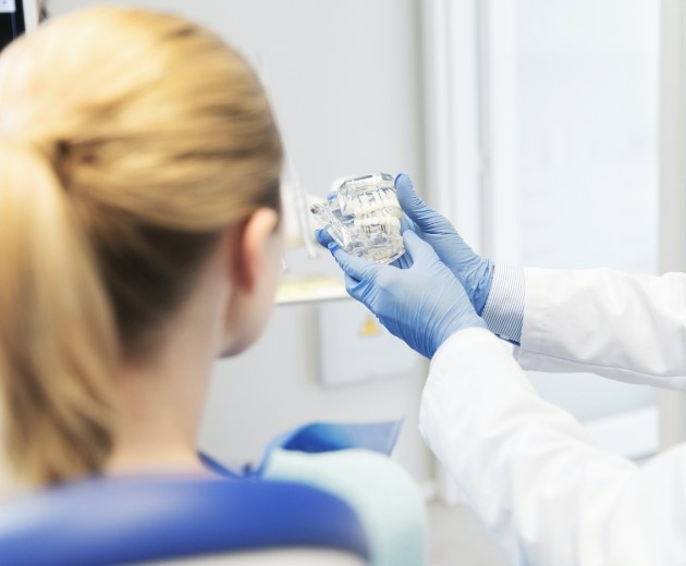 Patient talking to board certified oral surgeon