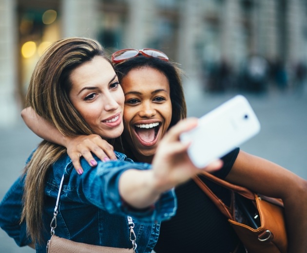Two women taking a selfie after Botox treatment