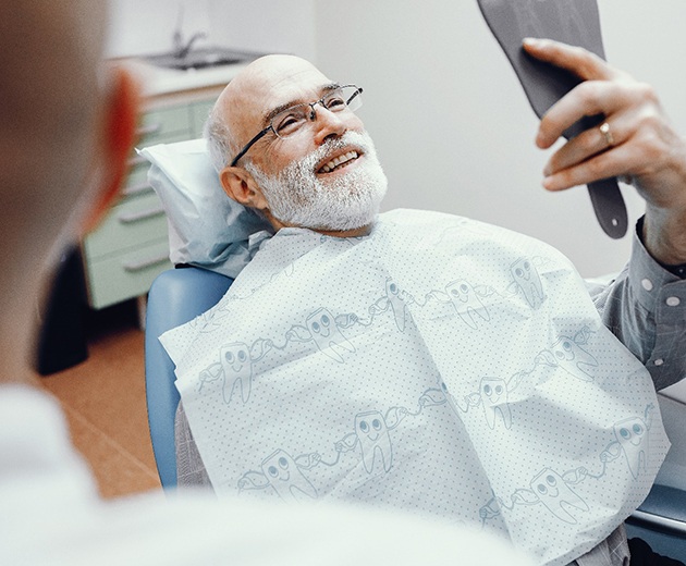 Man smiling in dental chair