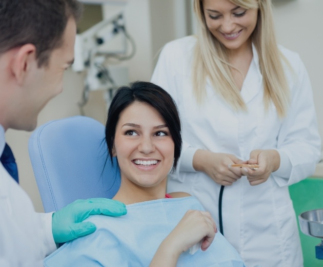 Doctor Yaghmai talking to oral surgery patient