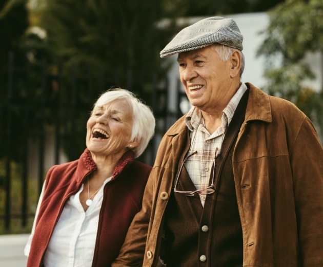 Man and woman enjoying the benefits of oral pathology