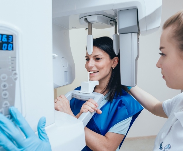 Patient receiving 3 D cone beam imaging scans