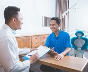patient talking to dentist   