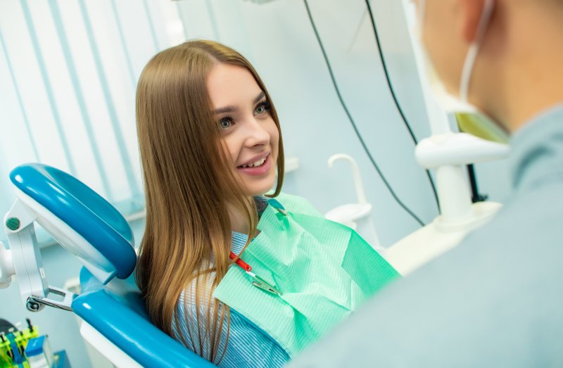 Patient learning about sedation dentistry from oral surgeon