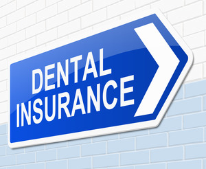 Blue sign on wall that reads “Dental Insurance”